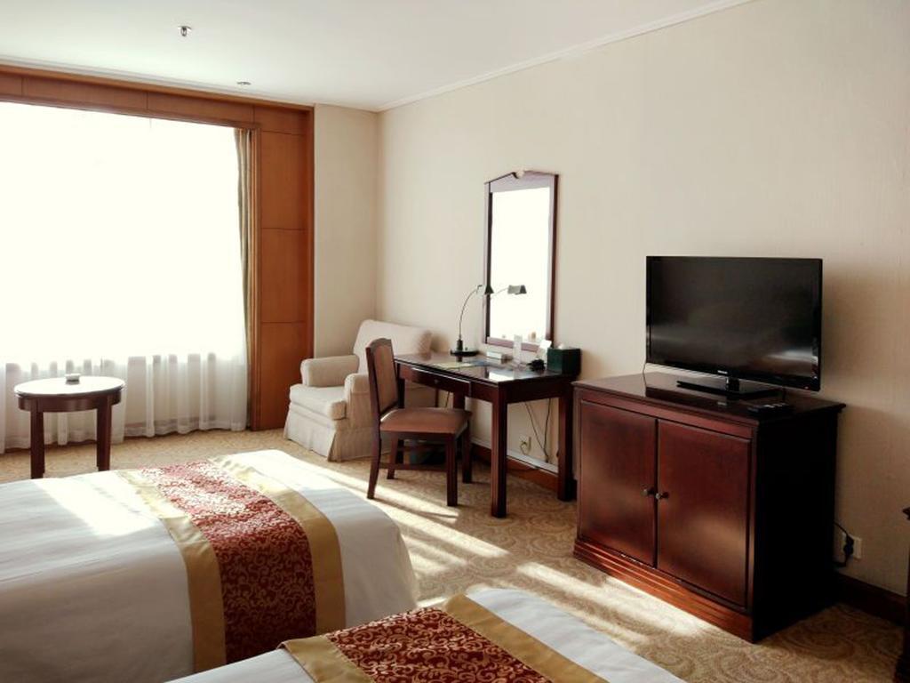 Central Plaza Hotel ต้าเหลียน ภายนอก รูปภาพ